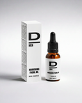 Bild in Galerie-Betrachter laden, Hautpflegeprodukt D Men Nourishing Facial Oil in braunem Glasflakon mit Pipette und weißer Verpackung.