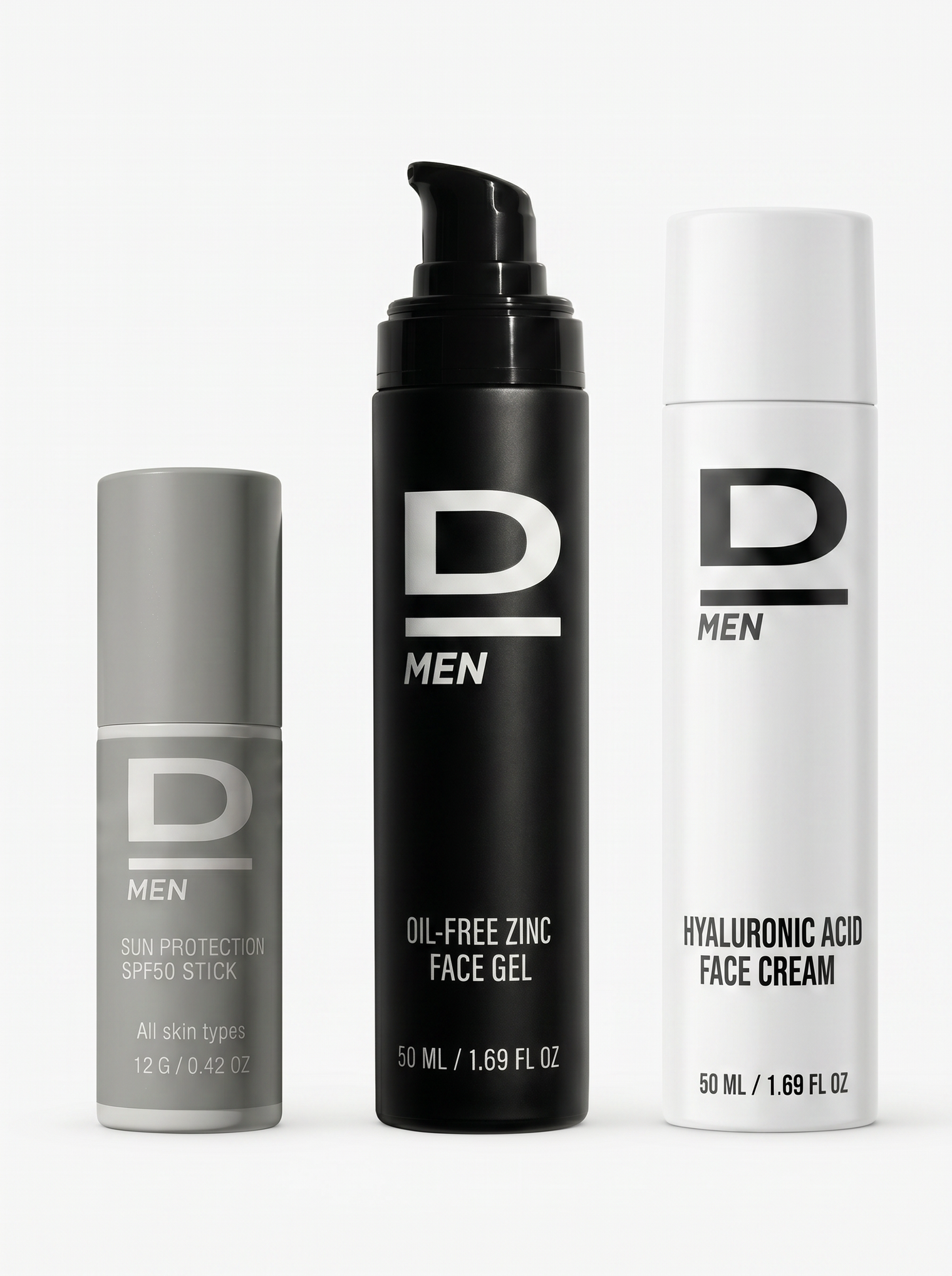Drei D MEN Hautpflegeprodukte in grauem, schwarzem und weißem Spender mit Beschriftungen zu Sonnenschutz, Gesichts-Gel und Gesichtscreme