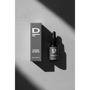 Flasche mit Pipette und Verpackung des Produkts 'D MEN F2 CAFFEINE GEL BOOSTER' auf hellem Untergrund mit Schatten
