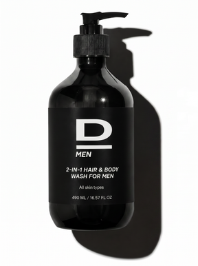 Schwarze Flasche mit Pumpverschluss und weißer Aufschrift für 2-in-1 Haar- und Körperwaschmittel für Männer