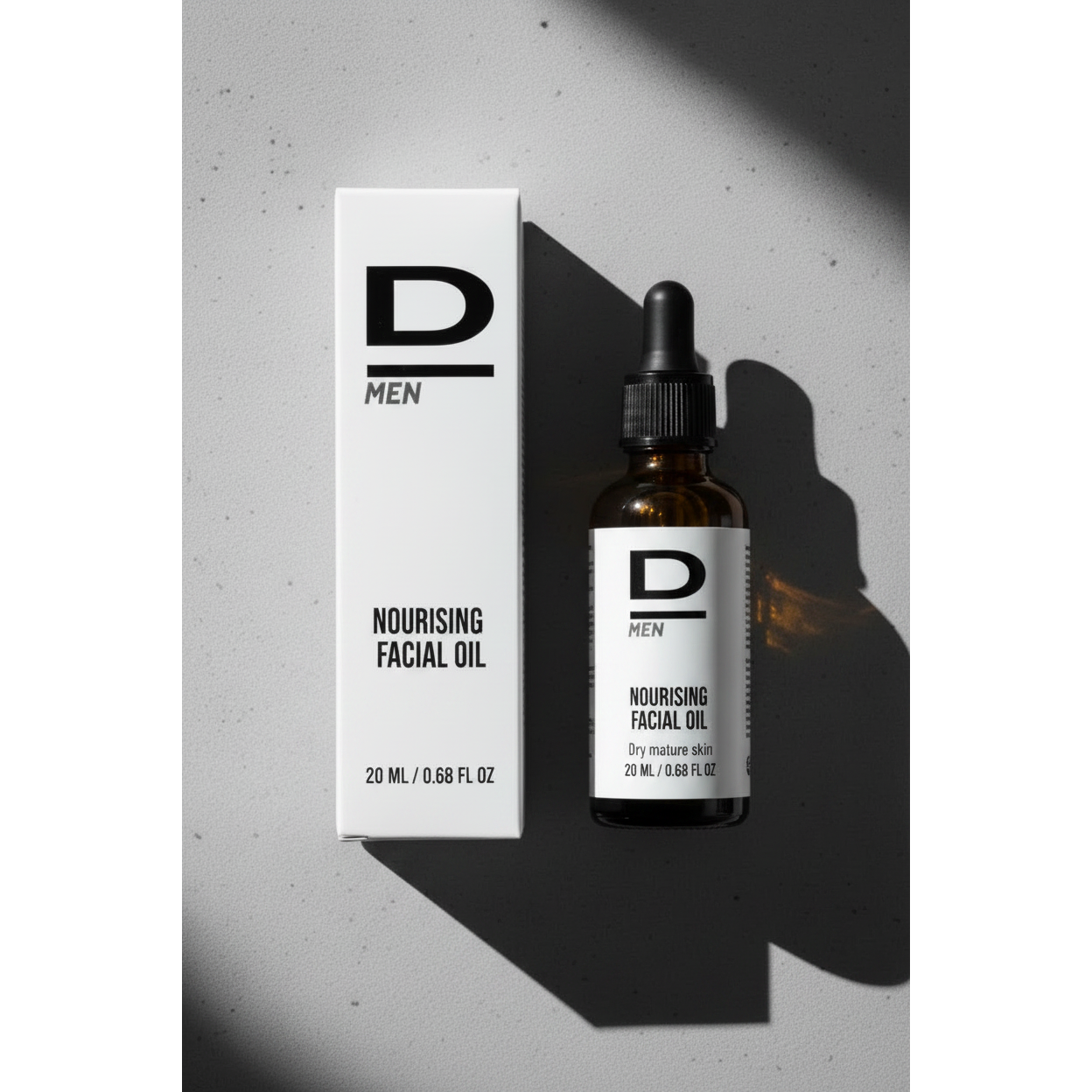 Flasche mit Pipette und Verpackung des Gesichtsöls 'D MEN Nourishing Facial Oil' auf hellem Untergrund mit Schatten